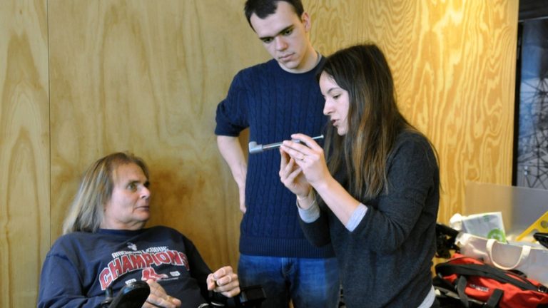 AT Professionals demonstrating mobility tool